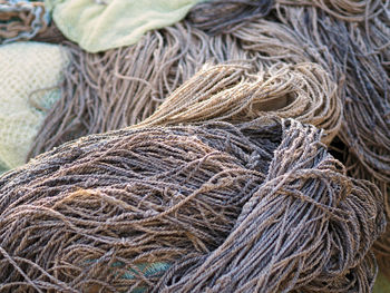 High angle view of tied up ropes at port