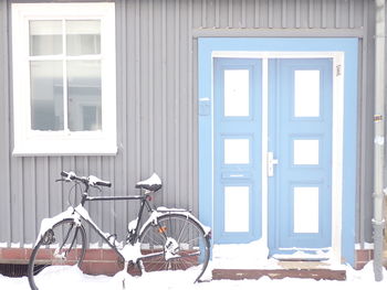 Bicycle parked outside building