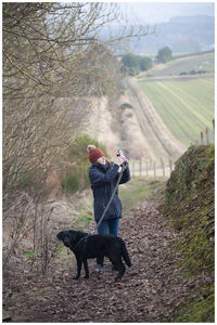 Full length of man standing on land