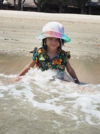 Full length of a girl enjoying in water