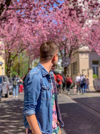 Full length of young man standing on street