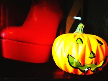 Close-up of illuminated pumpkin on table