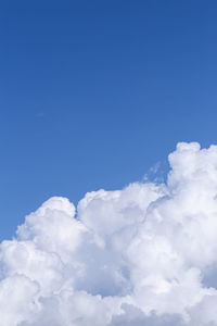 Low angle view of clouds in blue sky