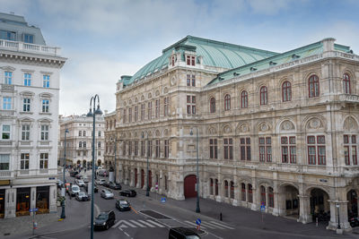 People in front of historic building