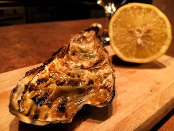 Close-up of oyster on table