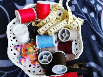 High angle view of various buttons on table