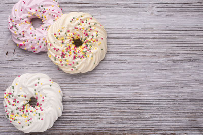 Directly above shot of donuts on table