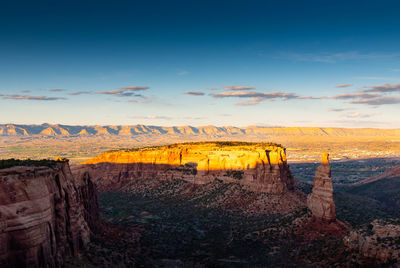 Scenic view of landscape against cloudy sky