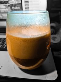 Close-up of beer in glass on table