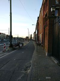 Road in city against sky