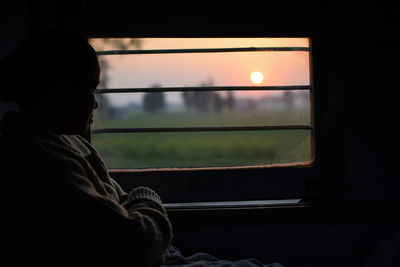 Woman traveling on train