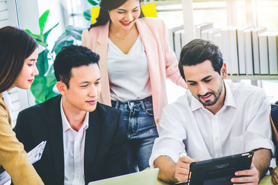 Young couple working in office