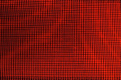 Full frame shot of illuminated red light against brick wall