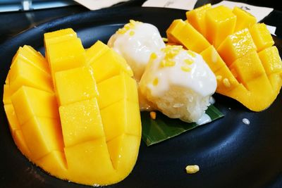 Close-up of fruits in plate