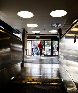People walking in corridor