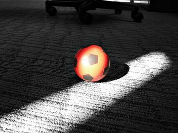 Close-up of red shoes on floor
