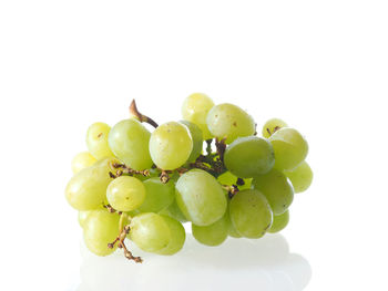 Close-up of fruit over white background