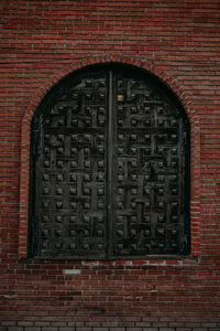 Low angle view of brick wall