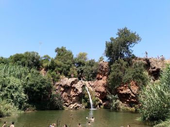 Scenic view of lake against clear sky