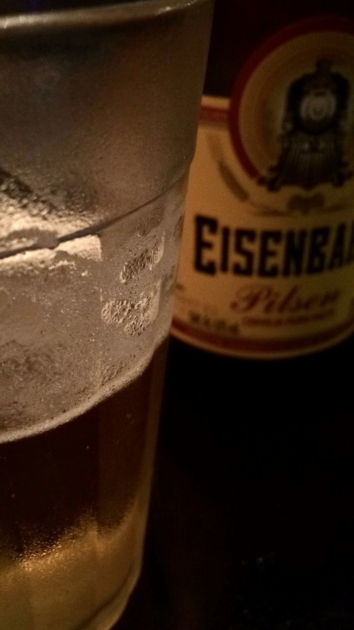 CLOSE-UP OF BEER GLASS WITH COFFEE