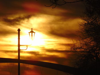 Low angle view of cloudy sky at sunset