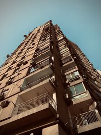 Low angle view of modern building against clear sky