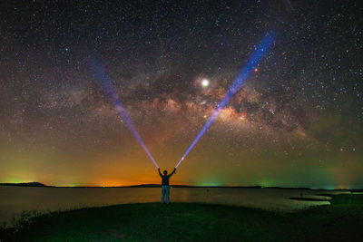 Scenic view of star field against sky at night