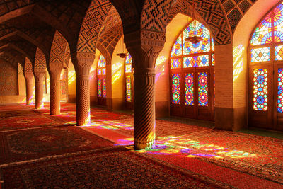 Illuminated corridor of building