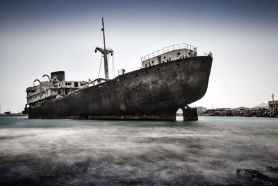 Shipwreck against sky