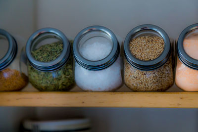 Close-up of candies in jar on table