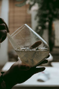 Close-up of hand holding drink