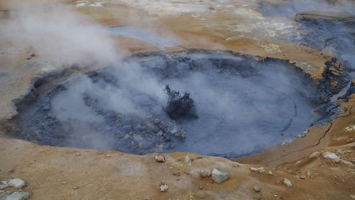 Scenic view of steam emitting for geyser