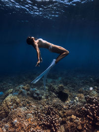 Man swimming in sea