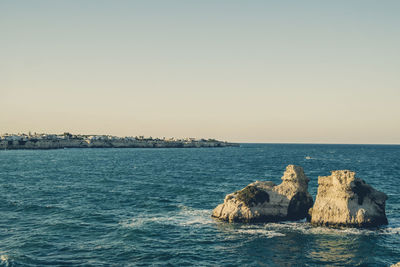 Scenic view of sea against clear sky