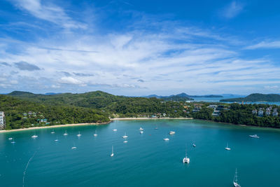 High angle view of boats in sea against sky