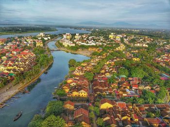 High angle view of river amidst buildings in city