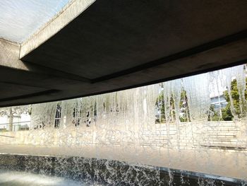 Reflection of bridge in water