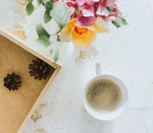 Directly above shot of coffee cup on table