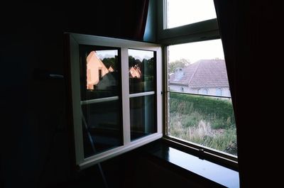 Reflection of building on glass window