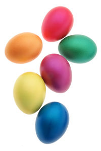 Close-up of colorful easter eggs against white background