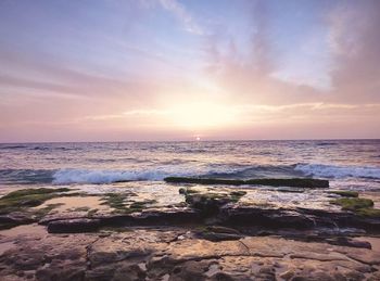 Scenic view of sea at sunset