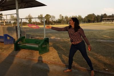 Full length of young man looking at camera