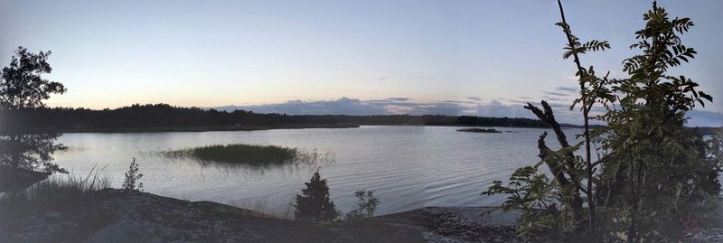 Scenic view of lake at sunset