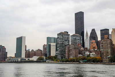 Modern buildings in city against sky