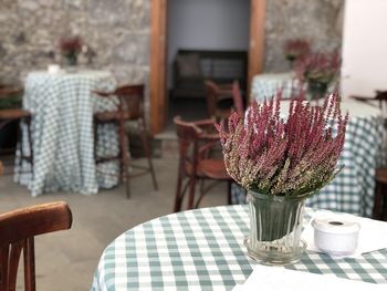 Empty chairs and tables in restaurant