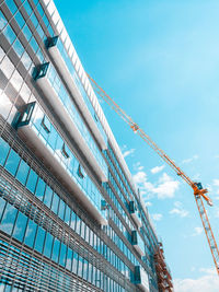 Low angle view of modern building against sky