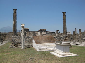 Old ruins against clear blue sky