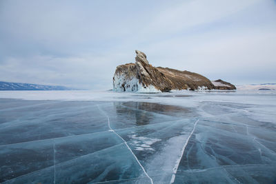 Scenic view of sea against sky during winter