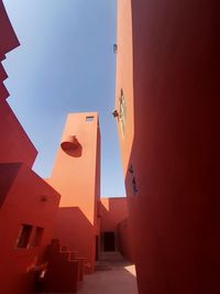 Low angle view of buildings against clear sky