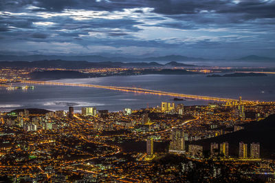 High angle view of city lit up